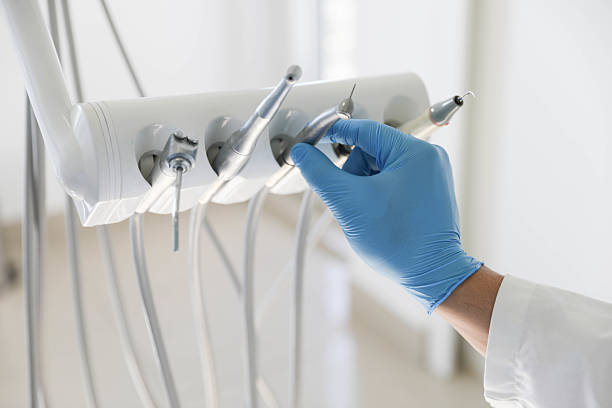Professional Emergency Dentist technician working in Sully Square, VA